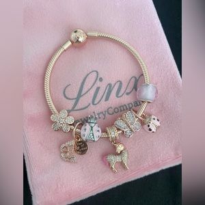 Linx Rose Gold Snake Chain Bracelet with Zircon Themed Charms